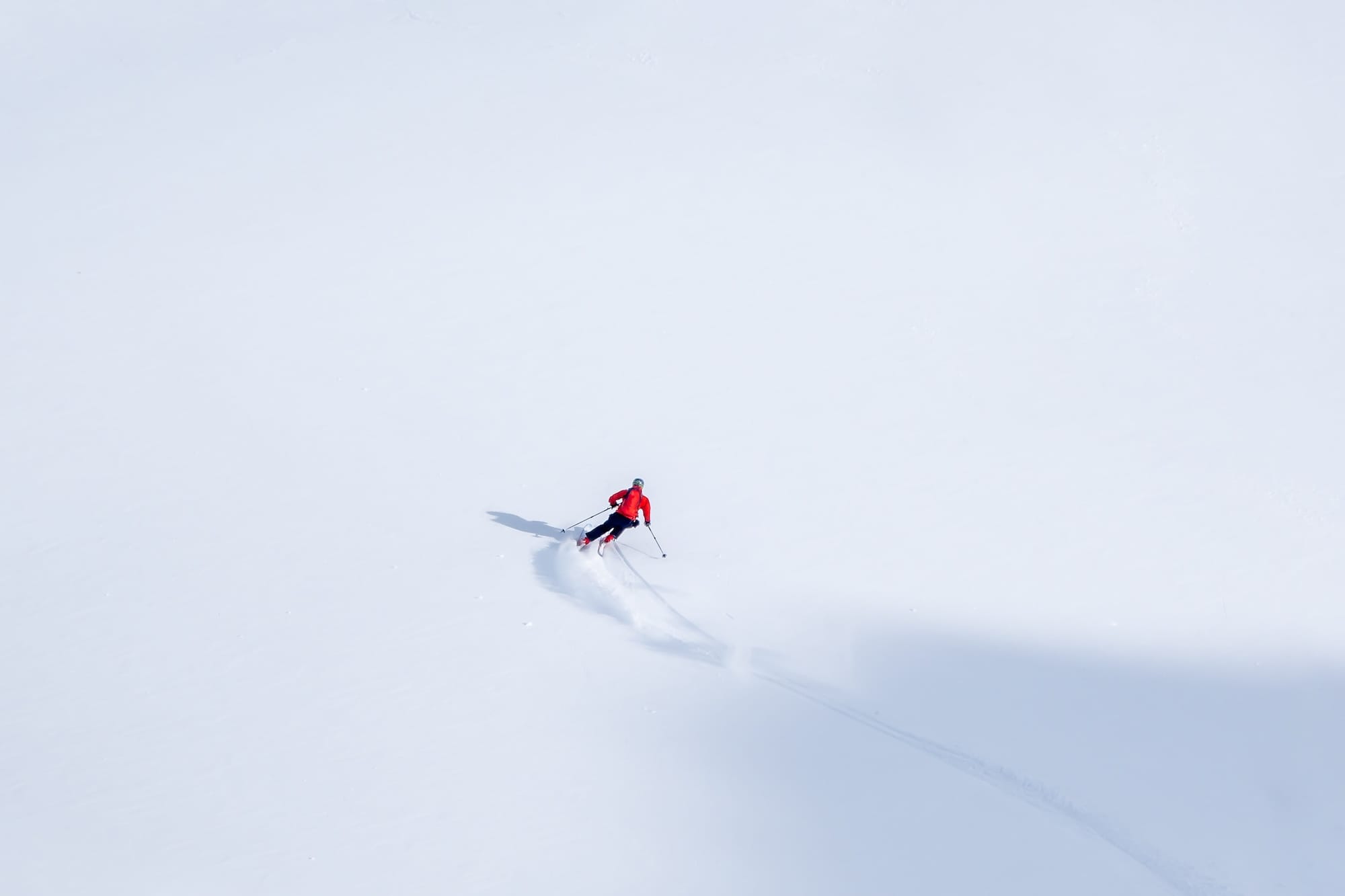 freerideskierinsnowcoveredmountainslopeinwintermaking